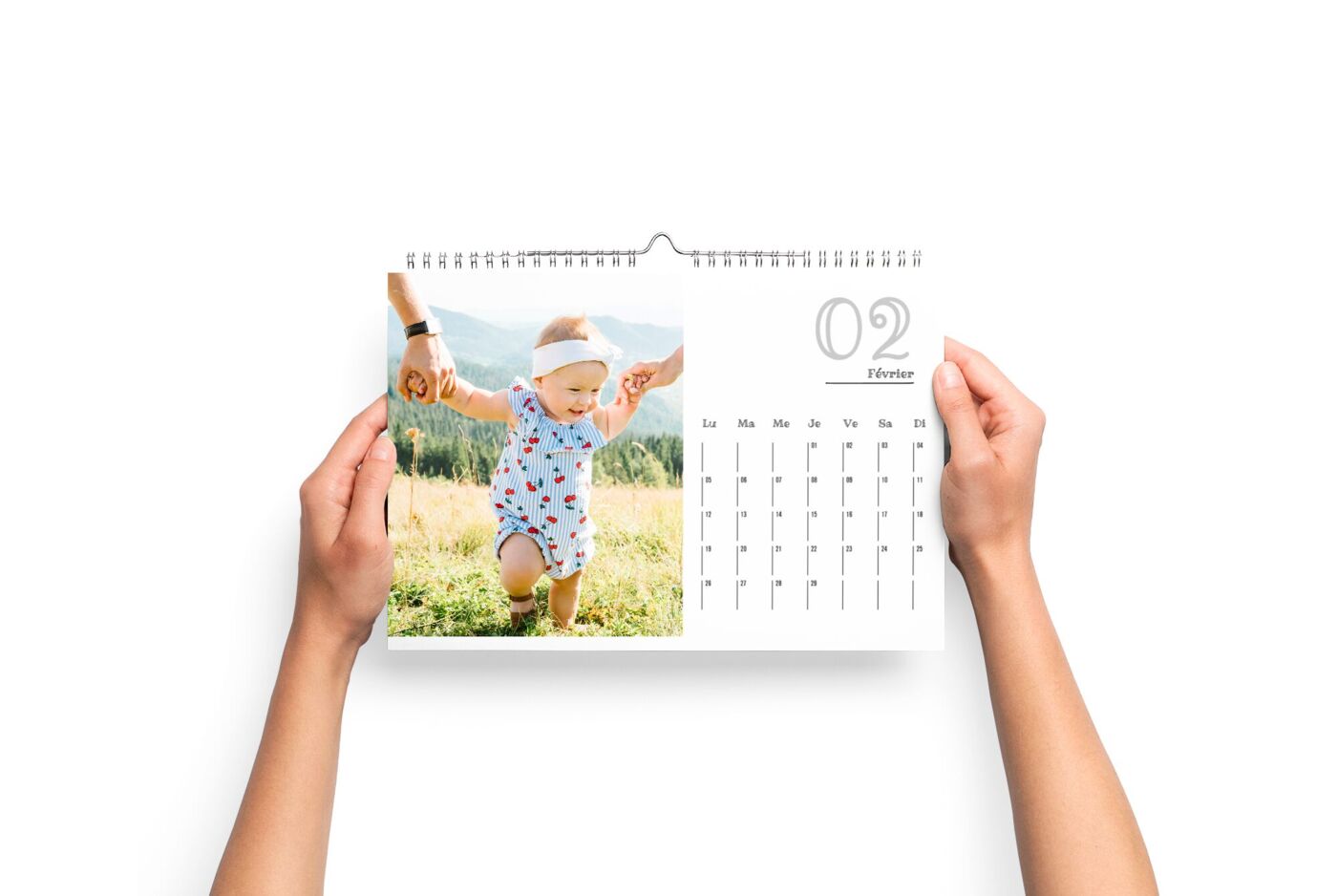 Calendrier mural A4 Paysage tenu entre les mains