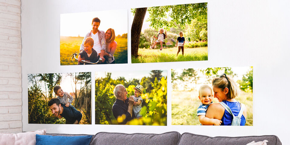 Family photos on a white wall with joyful outdoor moments.