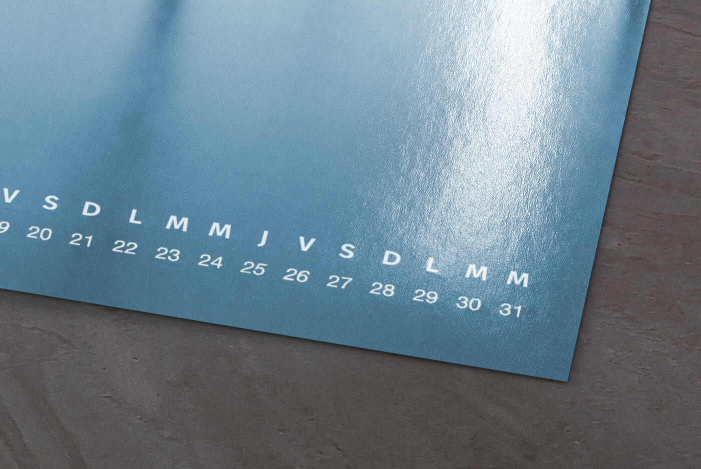 Calendrier photo brillant avec noms de mois et jours.